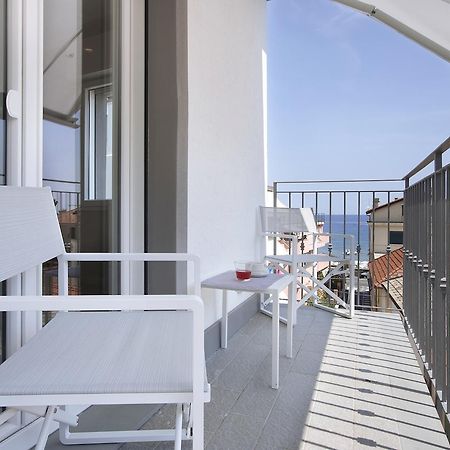 לאיגואליה Residence Dolcemare מראה חיצוני תמונה